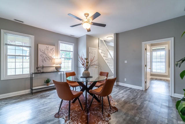 807 W Washington Blvd, Fort Wayne, IN 46802 - dining area featuring stairway, wood finished floors, baseboards, and a ceiling fan