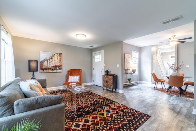807 W Washington Blvd, Fort Wayne, IN 46802 - living room with baseboards, wood finished floors, and ceiling fan