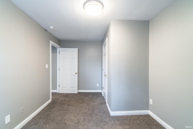 807 W Washington Blvd, Fort Wayne, IN 46802 - unfurnished bedroom featuring carpet flooring and baseboards