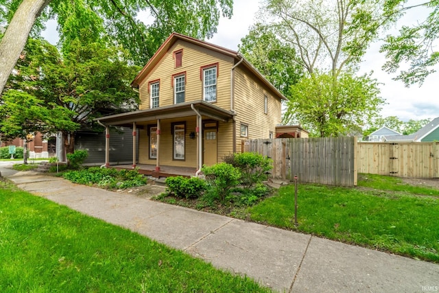 807 W Washington Blvd, Fort Wayne, IN 46802 - view of front of house with a gate and covered porch