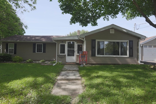 482 E Jefferson St, Andrews, IN 46702 - ranch-style house featuring a front yard, a garage, and a chimney