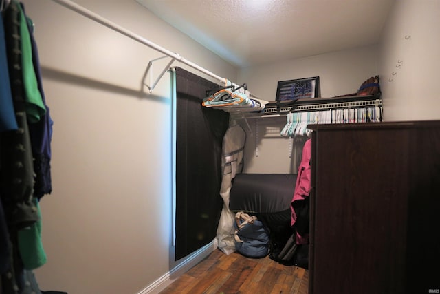 482 E Jefferson St, Andrews, IN 46702 - walk in closet featuring wood finished floors