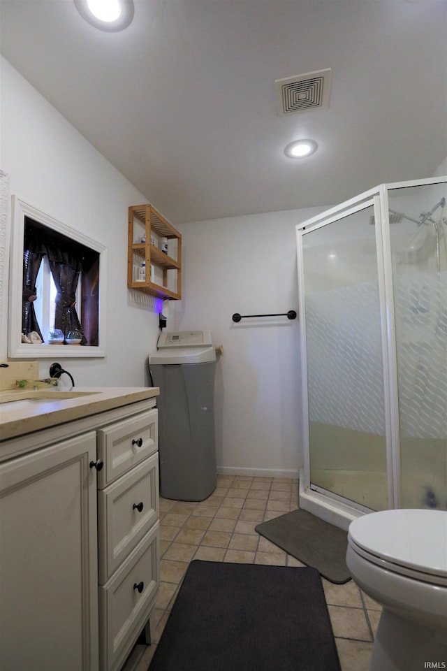 482 E Jefferson St, Andrews, IN 46702 - full bathroom featuring washer / dryer, toilet, tile patterned floors, vanity, and a stall shower