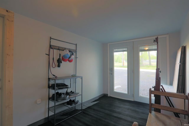 482 E Jefferson St, Andrews, IN 46702 - doorway featuring dark wood-style flooring and baseboards