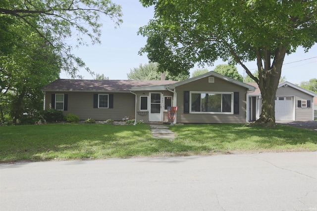 482 E Jefferson St, Andrews, IN 46702 - ranch-style house with a front lawn and a garage