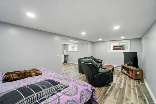 202 E Pickwick Dr, Syracuse, IN 46567 - bedroom featuring wood finished floors, recessed lighting, and baseboards