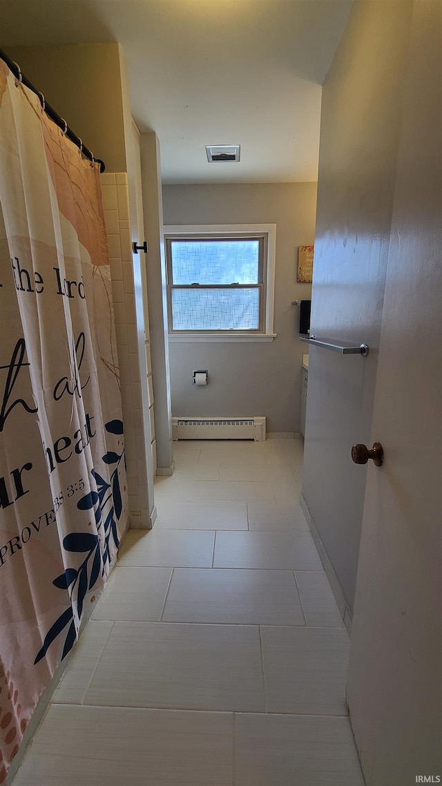 6403 Old Trail Rd, Fort Wayne, IN 46809 - bathroom with baseboard heating, tile patterned floors, curtained shower, and vanity