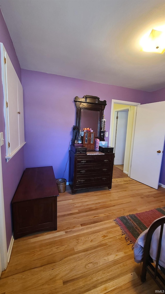 6403 Old Trail Rd, Fort Wayne, IN 46809 - bedroom with light wood-style floors and baseboards