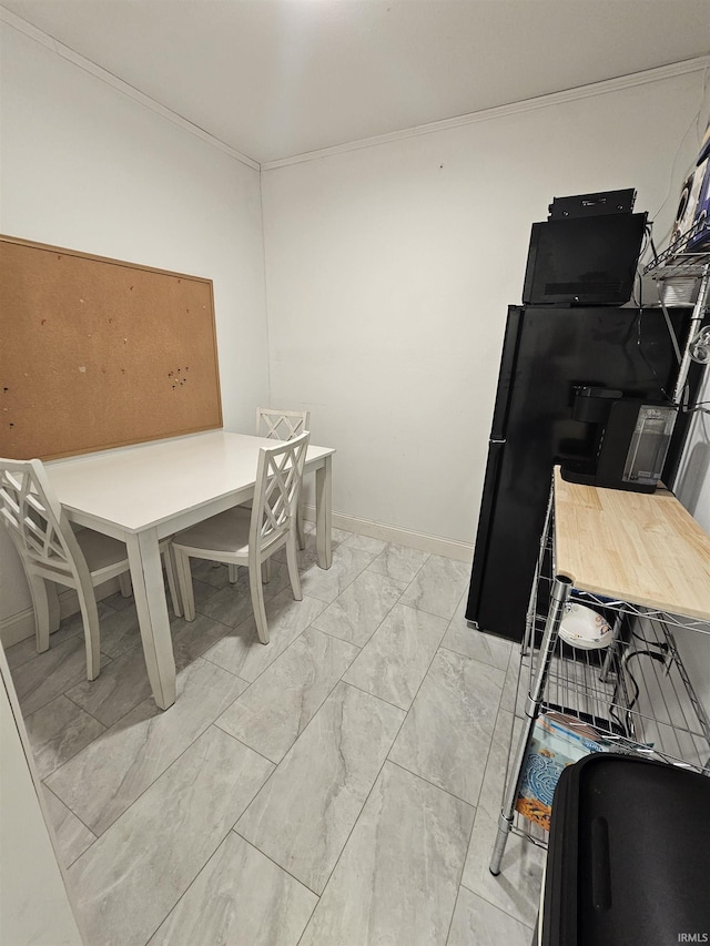 27 S Commerical St, Worthington, IN 47471 - dining area featuring light marble finish floors and baseboards