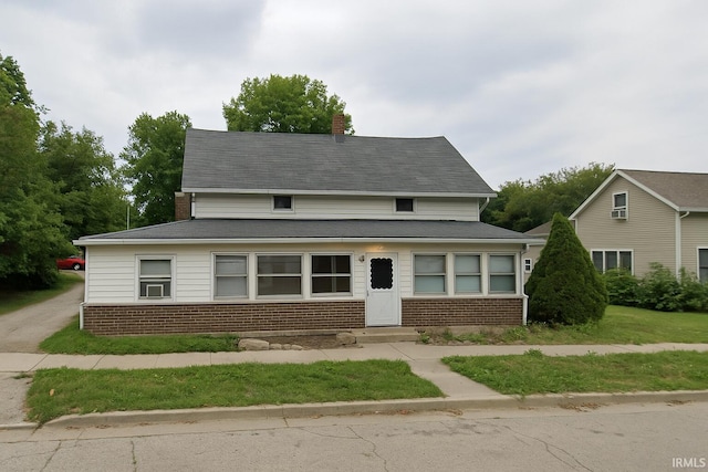 316 E Walnut St, Argos, IN 46501 - view of front of property featuring brick siding, a chimney, entry steps, and roof with shingles