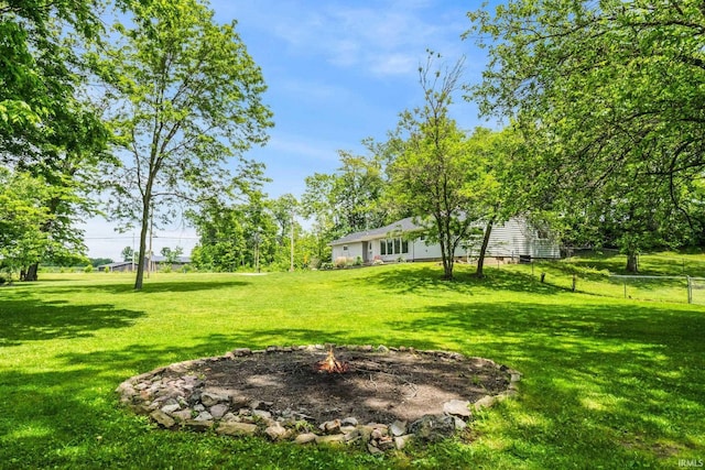 10317 Bass Rd, Fort Wayne, IN 46818 - view of yard with an outdoor fire pit