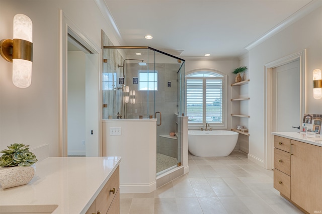 2909 Lake Dr, Newburgh, IN 47630 - bathroom with vanity, ornamental molding, a freestanding bath, a shower stall, and tile patterned flooring