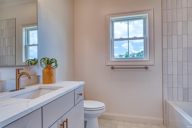 2909 Lake Dr, Newburgh, IN 47630 - bathroom with vanity, baseboards, and toilet