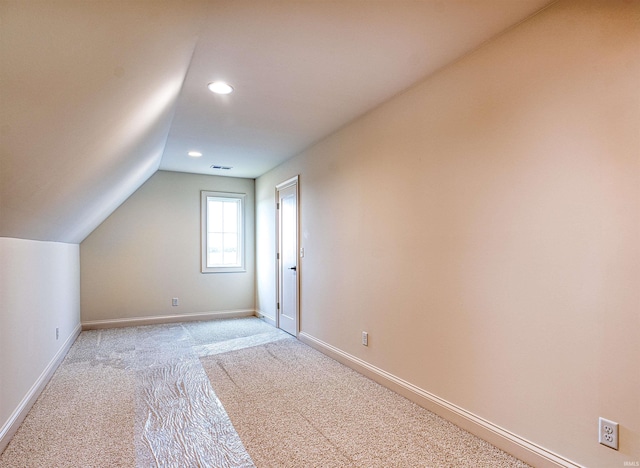 2909 Lake Dr, Newburgh, IN 47630 - bonus room featuring light carpet, baseboards, vaulted ceiling, and recessed lighting