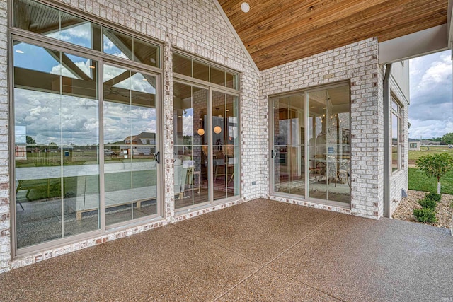 2909 Lake Dr, Newburgh, IN 47630 - unfurnished sunroom with vaulted ceiling