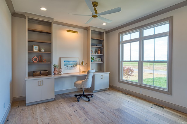 2909 Lake Dr, Newburgh, IN 47630 - office featuring ceiling fan, built in desk, plenty of natural light, light wood-type flooring, and recessed lighting