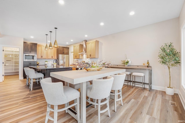 2088 Seward Lake Pass, Fort Wayne, IN 46814 - dining area with light wood-style flooring, recessed lighting, and baseboards