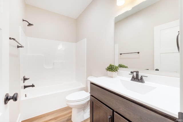 2088 Seward Lake Pass, Fort Wayne, IN 46814 - bathroom with vanity, wood finished floors, toilet, and tub / shower combination