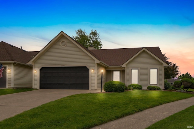 2223 Old Auburn Cv, Fort Wayne, IN 46845 - ranch-style house featuring a garage, driveway, a front yard, and roof with shingles