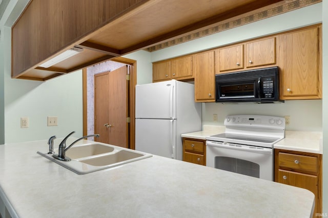 2223 Old Auburn Cv, Fort Wayne, IN 46845 - kitchen featuring white appliances, a sink, light countertops, and brown cabinets