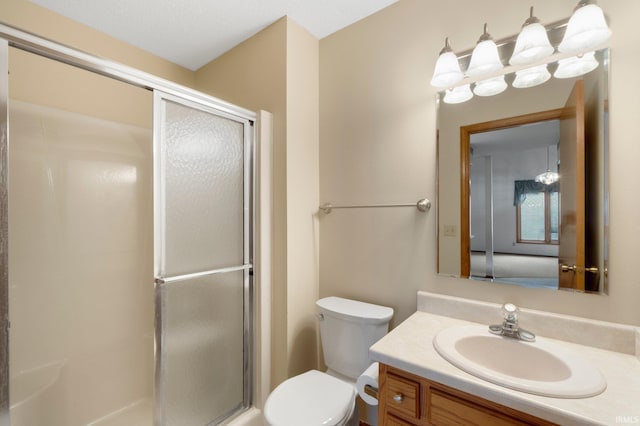 2223 Old Auburn Cv, Fort Wayne, IN 46845 - bathroom with a stall shower, vanity, and toilet