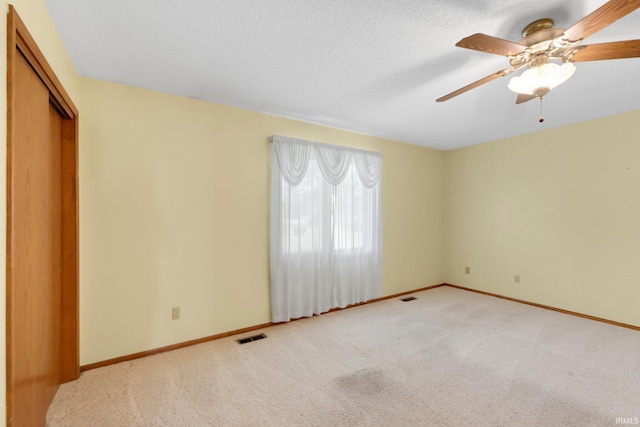 2223 Old Auburn Cv, Fort Wayne, IN 46845 - unfurnished bedroom featuring carpet flooring, baseboards, a closet, and ceiling fan