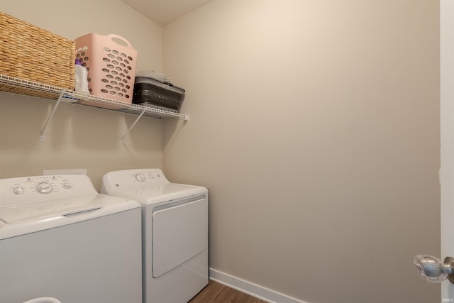 4755 Eastwick Dr, Newburgh, IN 47630 - washroom featuring washing machine and clothes dryer, wood finished floors, and baseboards