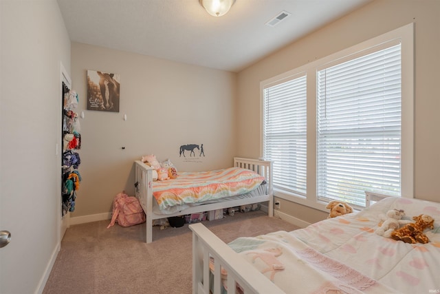 4755 Eastwick Dr, Newburgh, IN 47630 - bedroom with multiple windows, carpet, and baseboards