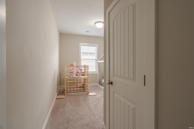 4755 Eastwick Dr, Newburgh, IN 47630 - hall with light colored carpet, baseboards, and a textured ceiling