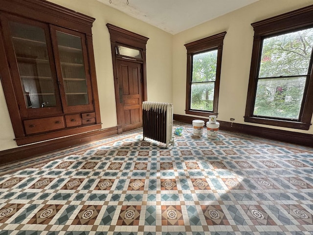 806 E Market St, Logansport, IN 46947 - unfurnished room featuring radiator and baseboards