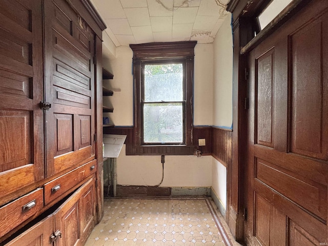 806 E Market St, Logansport, IN 46947 - bathroom with baseboards and a wainscoted wall