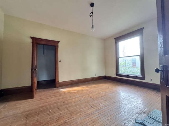 806 E Market St, Logansport, IN 46947 - empty room featuring hardwood / wood-style flooring and baseboards