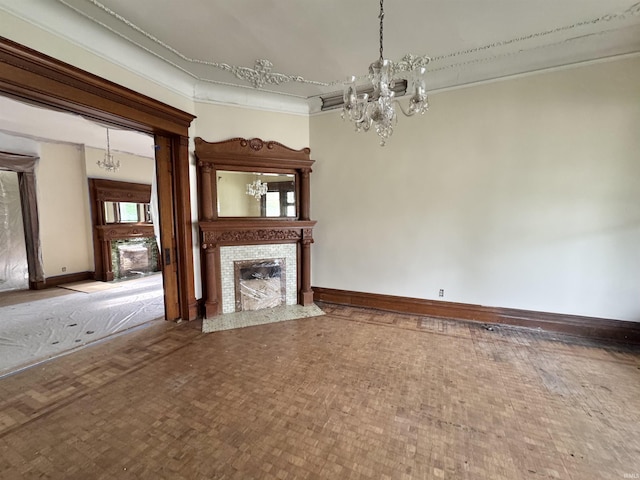806 E Market St, Logansport, IN 46947 - unfurnished living room with a chandelier, a fireplace with flush hearth, baseboards, and crown molding