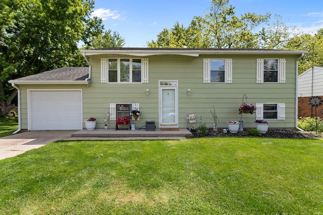 1804 Saint Charles Ct, Kokomo, IN 46902 - view of front facade featuring driveway, a front yard, and a garage