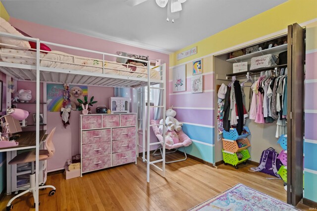 1804 Saint Charles Ct, Kokomo, IN 46902 - bedroom with wood finished floors, a closet, and ceiling fan