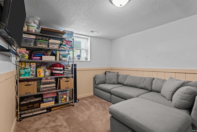 1804 Saint Charles Ct, Kokomo, IN 46902 - living room with a wainscoted wall, carpet flooring, and a textured ceiling