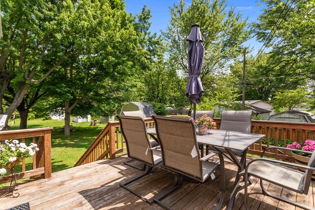 1804 Saint Charles Ct, Kokomo, IN 46902 - wooden deck with outdoor dining space and a yard