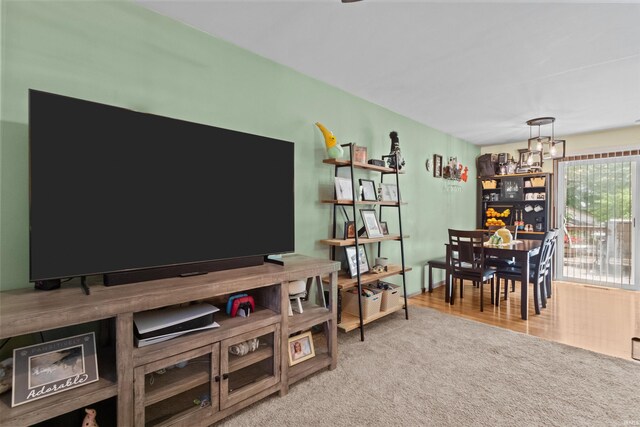 1804 Saint Charles Ct, Kokomo, IN 46902 - living room with carpet and a chandelier