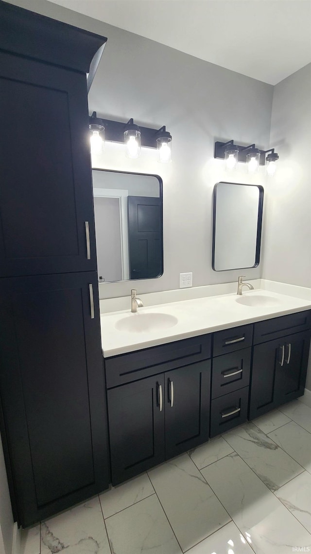 2022 W Blackberry Trl, Warsaw, IN 46582 - full bathroom featuring marble look tiles and double vanity