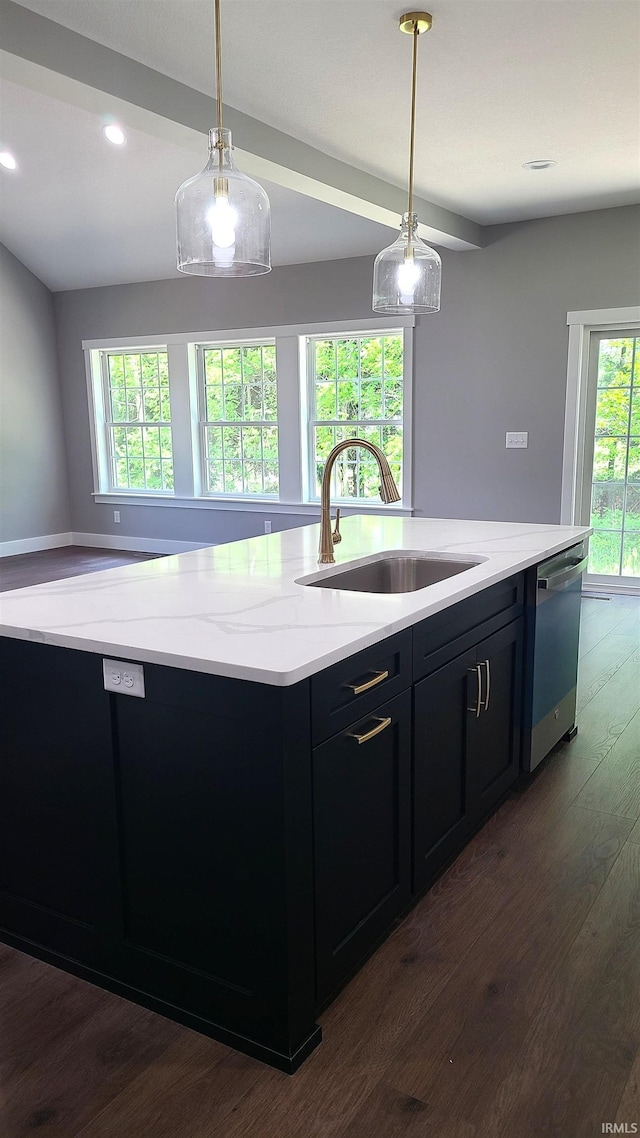 2022 W Blackberry Trl, Warsaw, IN 46582 - kitchen with dark cabinetry, a sink, stainless steel dishwasher, a kitchen island with sink, and pendant lighting
