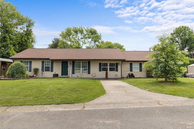 3739 S Westmont Ave, Bloomington, IN 47403 - ranch-style house with driveway and a front lawn