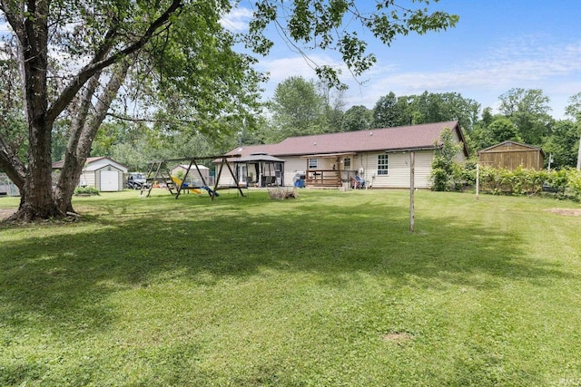 3739 S Westmont Ave, Bloomington, IN 47403 - view of green lawn with a deck