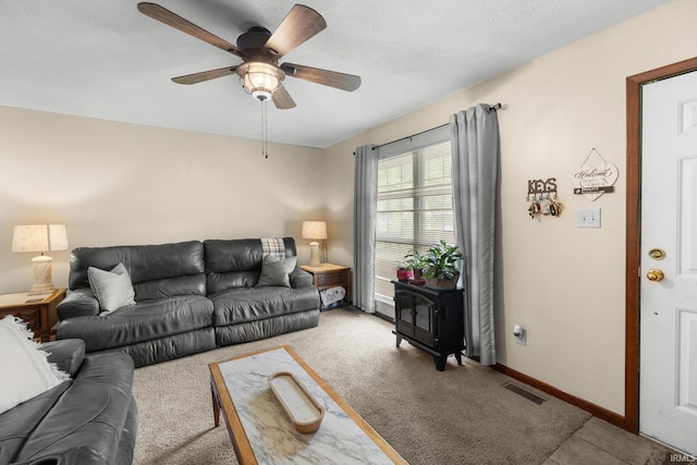 3739 S Westmont Ave, Bloomington, IN 47403 - carpeted living area featuring a ceiling fan and baseboards