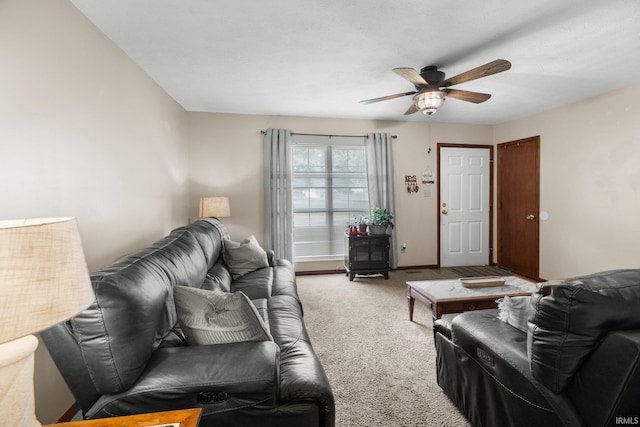 3739 S Westmont Ave, Bloomington, IN 47403 - carpeted living room featuring a ceiling fan and baseboards