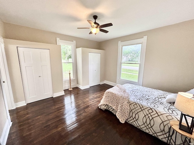 604 W Franklin St, Colfax, IN 46035 - bedroom with multiple windows, wood finished floors, baseboards, and a ceiling fan