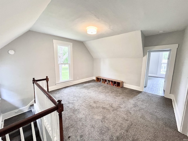 604 W Franklin St, Colfax, IN 46035 - additional living space featuring carpet, lofted ceiling, plenty of natural light, and baseboards