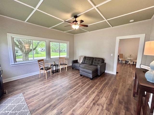 604 W Franklin St, Colfax, IN 46035 - living area featuring wood finished floors, a ceiling fan, baseboards, and coffered ceiling