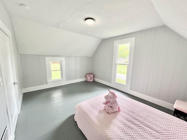 604 W Franklin St, Colfax, IN 46035 - bedroom featuring lofted ceiling, baseboards, and multiple windows