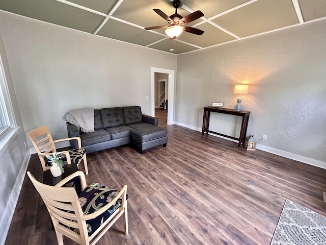 604 W Franklin St, Colfax, IN 46035 - living area featuring a ceiling fan, wood finished floors, and baseboards