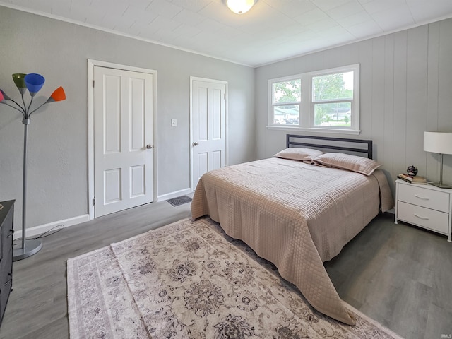 290 NW G St, Linton, IN 47441 - bedroom with wood finished floors, baseboards, and ornamental molding